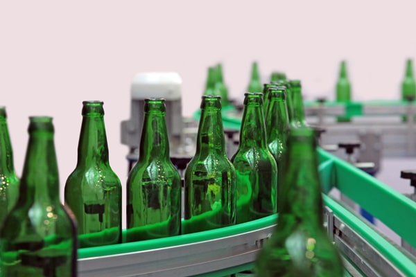 Bottles on Conveyor for Washing